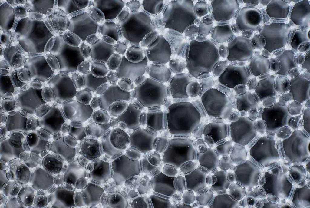 SEM image of ePTFE membrane showing unique node-and-fibril microporous structure